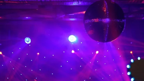Scenery of a disco. disco ball light fixtures. concert. scene Stock Footage 104355244