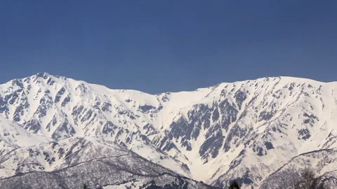 Scenery of the Hakuba Three Mountains, including Mount Hakuba Vídeo Stock 330190390