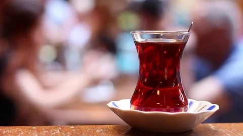 Scenery of hot tea on the old and old Turkish coffee table in Istanbul Stock Footage 116121463