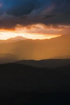 Scenery mountain range at sunset. Stock Photos