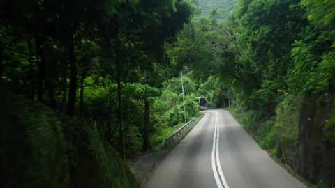 Scenery of mountain road view shot from a bus, Hong Kong Stock-Footage 314475078