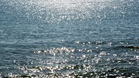 Scenery of ocean and surface shining in sunny day - 4k Stock Footage 297870149