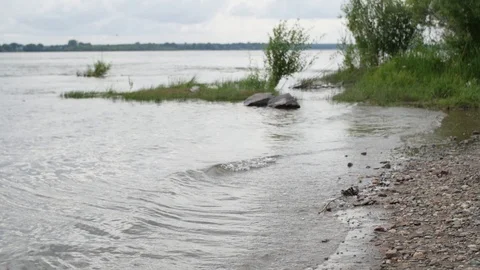 Scenery of river stream flowing between rocks with motion blur due to slow Stock-Footage 107180972
