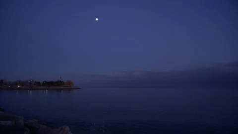 The scenery of the riverbank under the moonlight Stock Footage 329201620