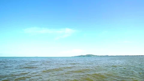 Scenery Sea waves on the beach with mountain Stock Footage 119248839