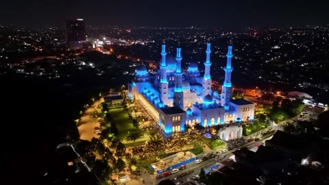 Scenery of Sheikh Zayed Grand Mosque with lights illuminating the mosque Stock Footage 304108062