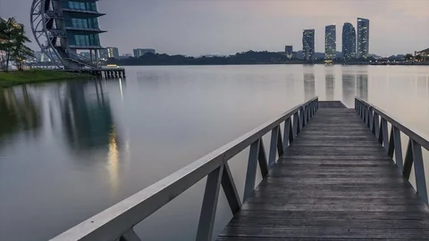 Scenery of sun rising at Pullman jetty, Putrajaya. Pan Right Timelapse Motion Stock Footage 83016275