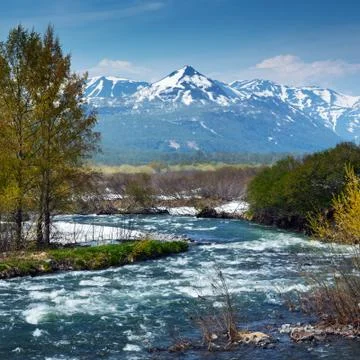 Scenery view of spring rugged mountain river on Kamchatka Peninsula Stock-Fotos