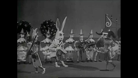Scenes from a 1950s era stop motion and live action film of Alice and Video stock 118440791