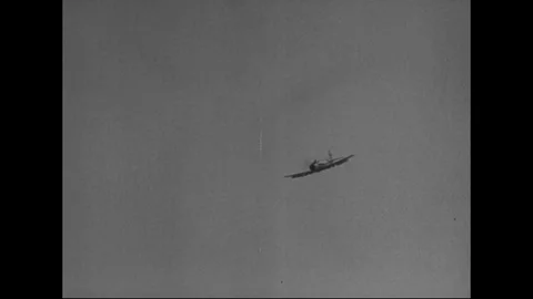 Scenes of air strike on battle field, civilian march on road - 1964 Stock Footage 101910124
