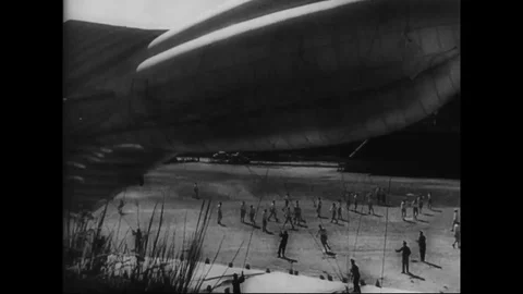 Scenes of barged balloons are raised and officer plot location of balloons- 1942 Vídeos de archivo 101917802