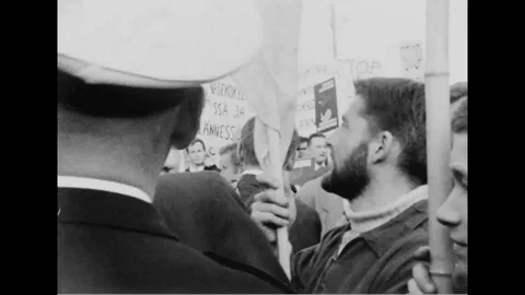 Scenes of crowd parade for Nuclear Disarmament on street - 1962 Video stock 112156290