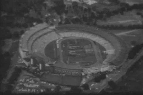 Scenes of Olympic stadium, athletes and Rafer Johnson in Melbourne - 1962 Stock Footage 106618461
