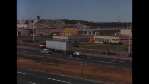 Scenes of parking area and vehicles driving on road in Kansas City - 1961 Stock Footage 99784923
