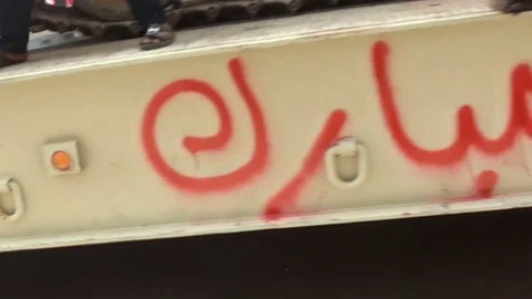 Scenes of protesters flocking to Tahrir Square Stock Footage 114802211