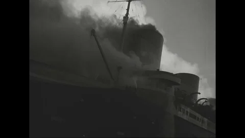Scenes of rescue in progress and smoke billows from SS Normandie - 1942 Stock Footage 101729044