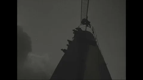 Scenes of rescue in progress and smoke billows from SS Normandie - 1942 Stock Footage 101729071