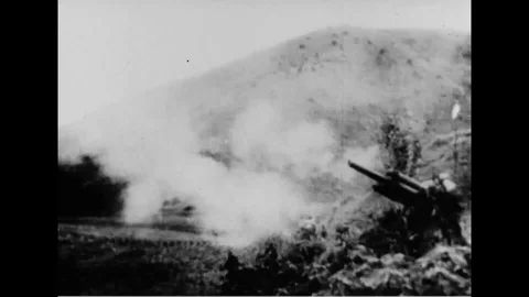 Scenes of soldiers attack enemy positions and military tanks travel on road-1952 Stock Footage 107556189