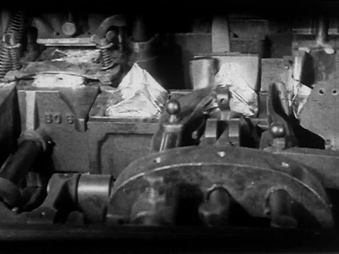 Scenes of tea being packed by machine - 1920 Stock Footage 109207401