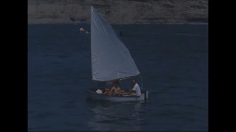 Scenes of tourists in different vessels sail in the sea - 1965 Stock Footage 103201633
