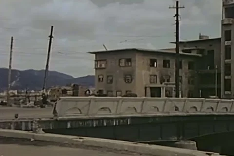 Scenes of vehicles driving on damaged bridge - 1946 Stock Footage 103372293