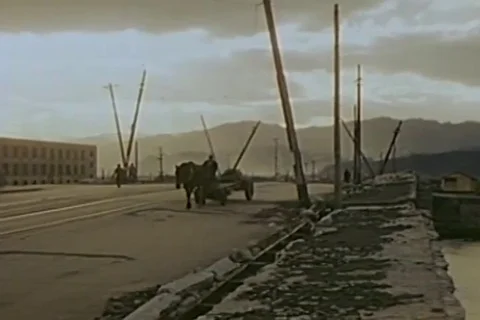 Scenes of vehicles driving through damaged bridge - 1946 Stock Footage 103372420