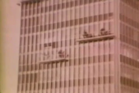 Scenes of window washers work on a skyscraper, men carry milk cans - 1958 Stock Footage 106709570