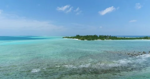 Scenic Aerial Drone fly over shot above Maldives Tropical Island Stock-Footage 89942379