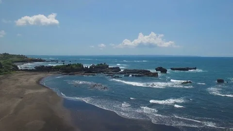 Scenic aerial fly over grey sand coastline Stock Footage