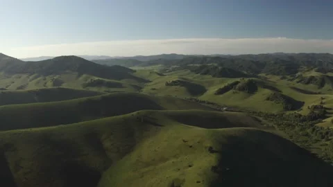 Scenic aerial panoramic view of idyllic rolling hills spring landscape in with Stock Footage 137838357