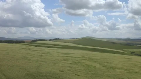 Scenic aerial panoramic view of idyllic rolling hills spring landscape in with Stock Footage 138114352