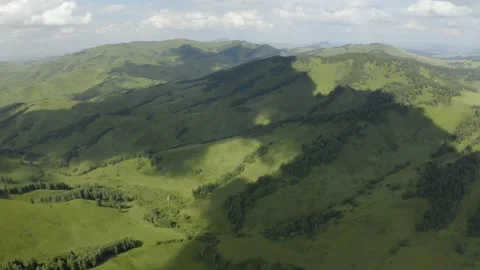 Scenic aerial panoramic view of idyllic rolling hills spring landscape in with Stock Footage 138132040