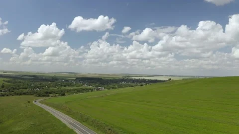 Scenic aerial panoramic view of idyllic rolling hills spring landscape in with Video stock 138255338