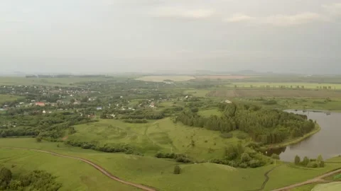 Scenic aerial panoramic view of idyllic rolling hills spring landscape in with Stock Footage 138296170