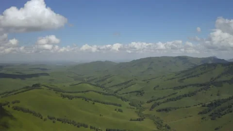 Scenic aerial panoramic view of idyllic rolling hills spring landscape in with Stock Footage 138380536