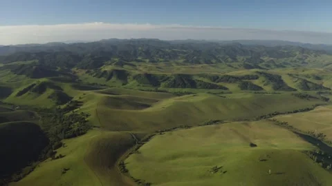 Scenic aerial panoramic view of idyllic rolling hills spring landscape in with Stock Footage 138514052