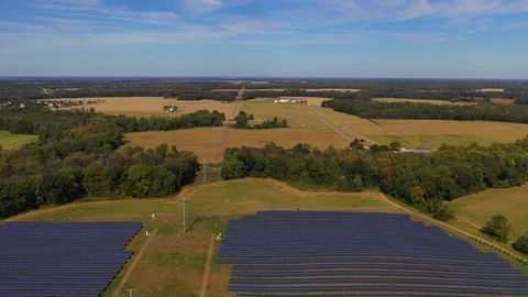 Scenic Aerial Pullback Shot of a Solar Farm Stock Footage 118666898