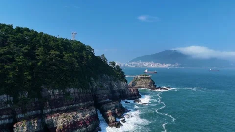 Scenic aerial view of amnan park cliffs and blue sea in busan, south korea Stock Footage 341908765