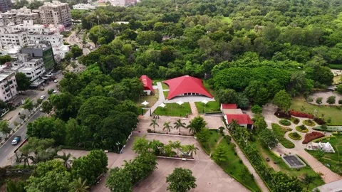 Scenic Aerial View of a Beautiful Architectural Home Surrounded by Lush Greenery Stock-Footage 344021353
