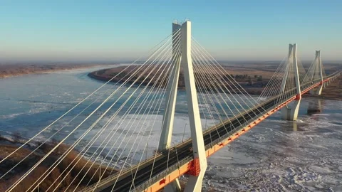 Scenic aerial view of cable-stayed bridge over frozen Oka river near Murom city Stock Footage 159781044
