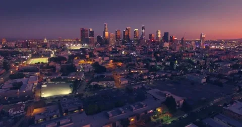 Scenic aerial view city downtown Los Angeles skyline sunset twilight dusk night Stock Footage