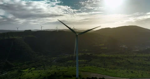 Scenic Aerial view of Large Wind Power Turbines with Blades in a Field during Stock Footage 239177857