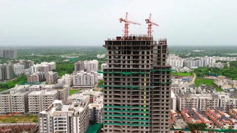 Scenic Aerial View of a Modern Construction Building Rising in a Vibrant City Stock-Footage 344021359