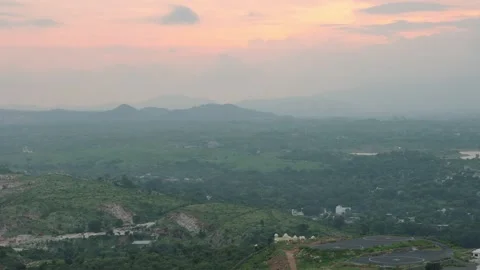 Scenic Aerial view of Mountains with dramatic sunset Cloudy evening Sky Stock Footage 290514425