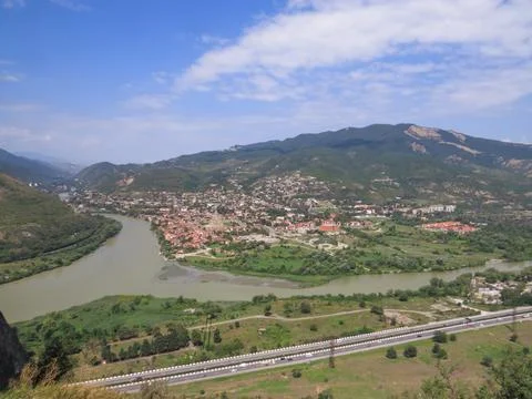 Scenic aerial view of Mtskheta town, the confluence of Aragvi and Kura rivers Stock Photos