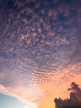 Scenic Altocumulus Clouds at Sunset Stock Photos