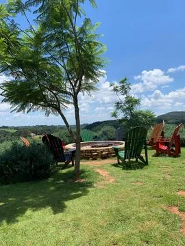 Scenic backyard fire pit area Stock Photos