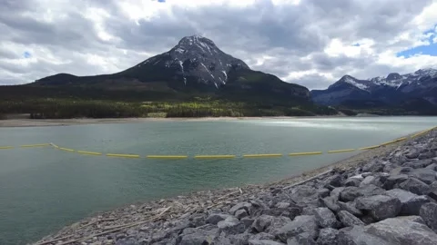 Scenic Barrier Lake in Kananaskis surrounded by mountains, Alberta Canada. Video stock 158116653