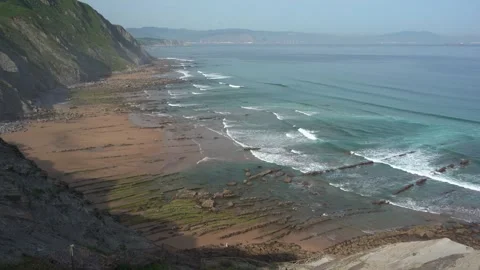 Scenic basque coast flysch cliffs and beach Видео 336506192