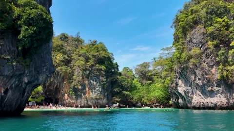 Scenic Beach at Ko Lao La Ding with Tourists Enjoying the Sun Stock Footage 332797446